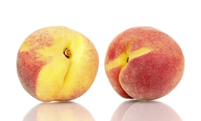ripe peaches isolated on white.