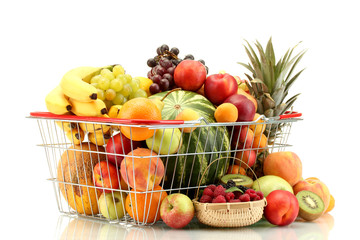 Assortment of exotic fruits in metal basket and berries