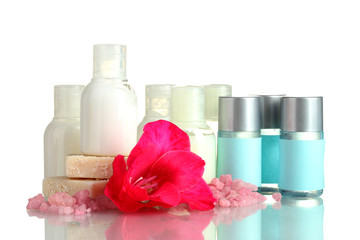 Fototapeta na wymiar cosmetic bottles, soap and flower, isolated on white.