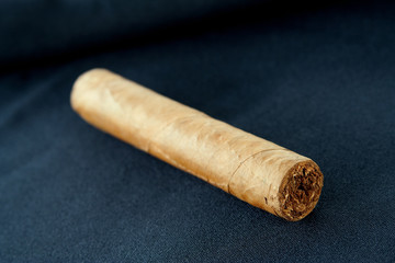 A cigar on a black background