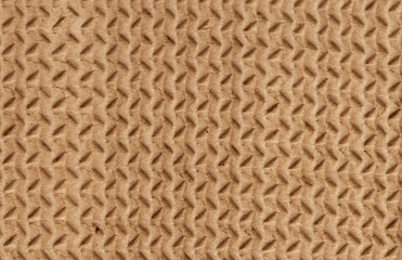 Clear yellow corrugated cardboard texture. Closeup. Horizontal