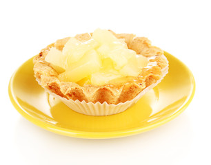 sweet cake with fruits on saucer isolated on white