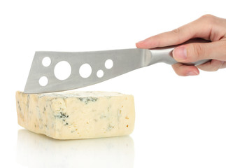 Woman's hand cut blue cheese on white background close-up