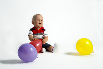 Fototapeta na wymiar Little boy and balloons