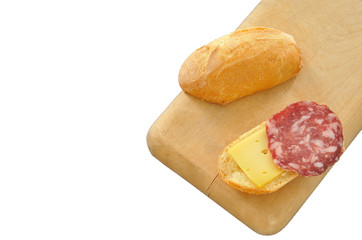 Italian snack with bread, salami and cheese