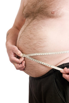 Over weight male with measuring tape