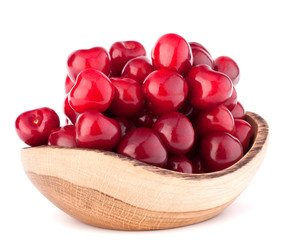 cherry berries in wooden bowl