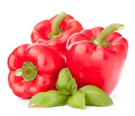 Sweet red pepper and basil leaves still life