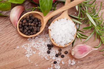 Fresh herbs and salt spoon