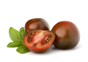 Tomato kumato and basil leaf