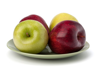 Apples pile on plate
