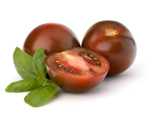 Tomato kumato and basil leaf