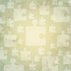 Jigsaw icon on old paper background and pattern
