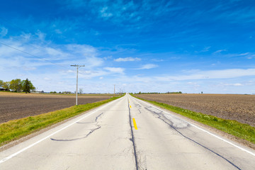 American Country Road With Cloudy Blue Sky