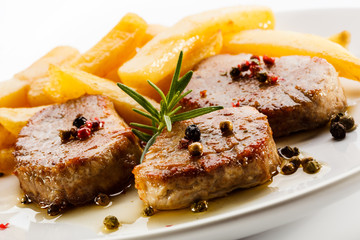Grilled steaks with French fries