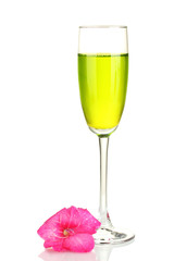 glass with cocktail and gladiolus bud isolated on white