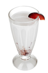 Delicious milk shake with fruit isolated on white