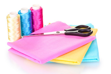 Sewing accessories and fabric isolated on white