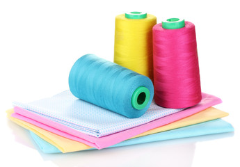 Sewing accessories and fabric isolated on white
