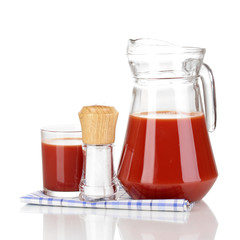 Tomato juice in pitcher and glass isolated on white