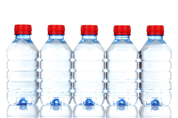 plastic bottles of water isolated on white