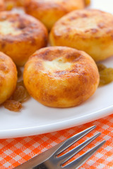 Homemade sweet cheese pancakes with raisins