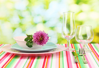 Table setting on bright background close-up