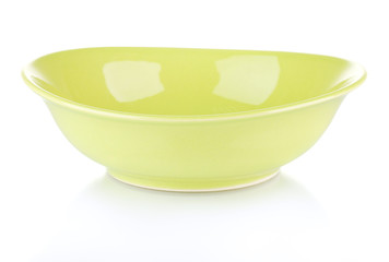 Green empty bowl isolated on white
