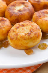 Homemade sweet cheese pancakes with raisins