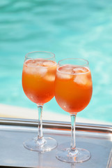 Pair of cocktails at the swimming pool