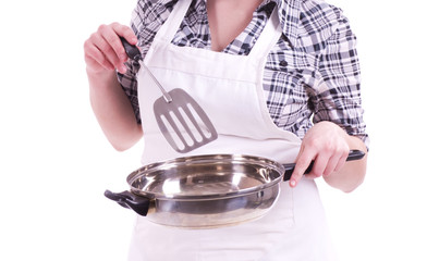 Cook woman holds a frying pan