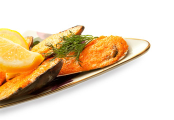 Yummy baking mussels under roe isolated on white