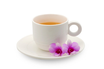 A cup of tea with pink orchids on white background