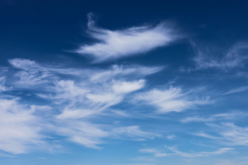 Naklejka na ściany i meble bright cumulus clouds and blue sky