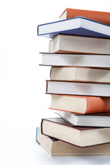A stack of books on a white background.