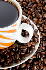 Coffee cup and coffee beans