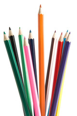Color pencils over white background