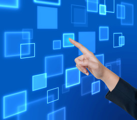 Hand pushing button on a touch screen interface