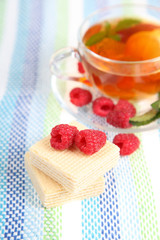 Tea with raspberries and mint