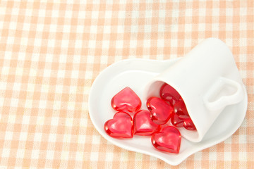 Red heart and heart shaped coffee cup