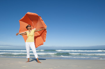 Pretty mature woman ocean background