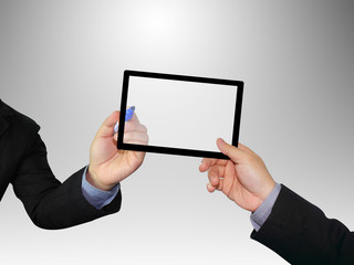 Hands holding a tablet with clipping path