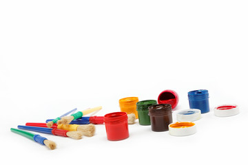 Brushes and paints isolated on a white background.