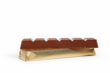 Chocolate bar in foil isolated on white background