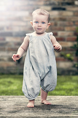 Pretty Baby Girl in Blue Jumpsuit