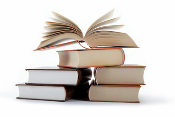 A stack of books on a white background.