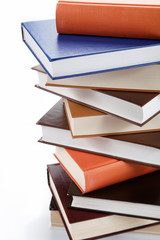 A stack of books on a white background.