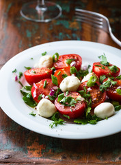 Tomato salad with mozzarella and fresh herbs