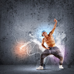 Naklejka na ściany i meble Młody mężczyzna tańczy hip hop z linii kolorystycznych