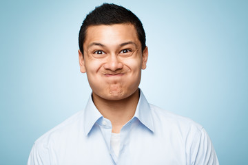 funny face young man close up portrait